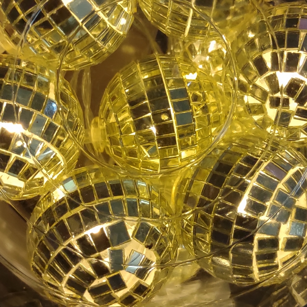 Gold disco ball light string. New in box 5.9ft